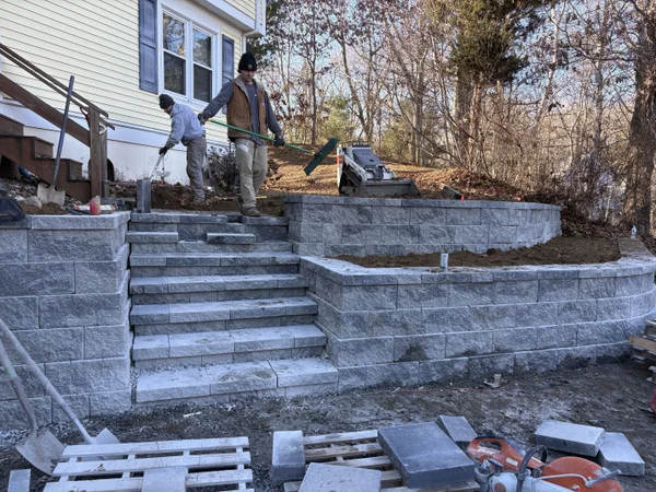 Expert retaining wall construction and installation by MAC Excavation & Landscape in South Shore MA
