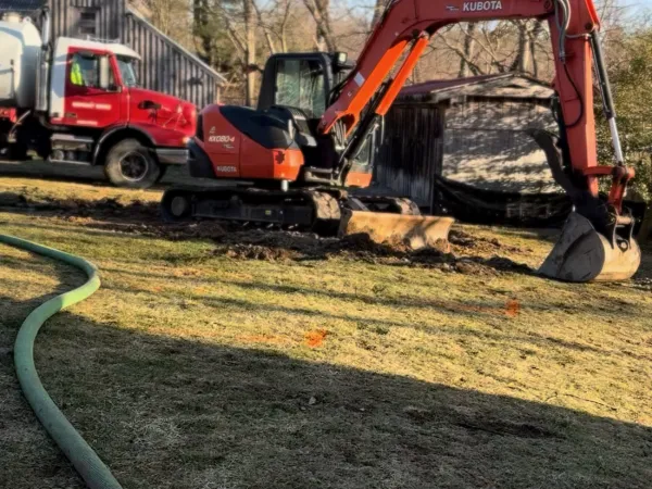 Completed septic system site grading and yard restoration by MAC Excavation & Landscape in South Shore MA