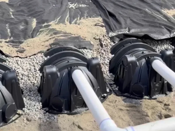 Septic system infiltration chambers with PVC piping during installation by MAC Excavation & Landscape